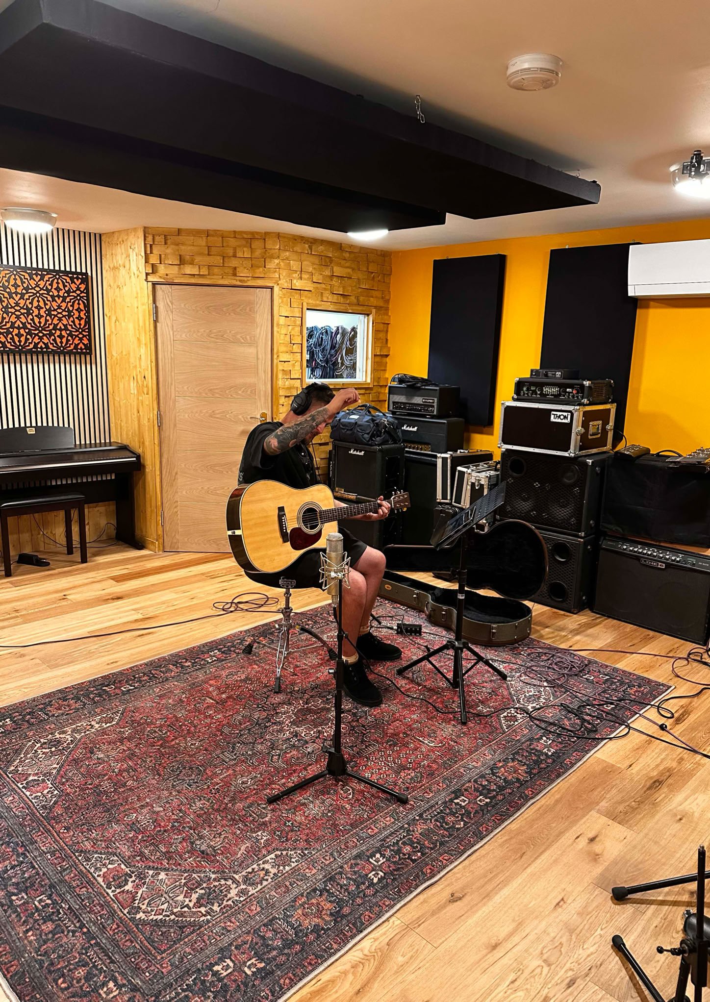 Tracking acoustic guitar in the Oastview Studio live room.