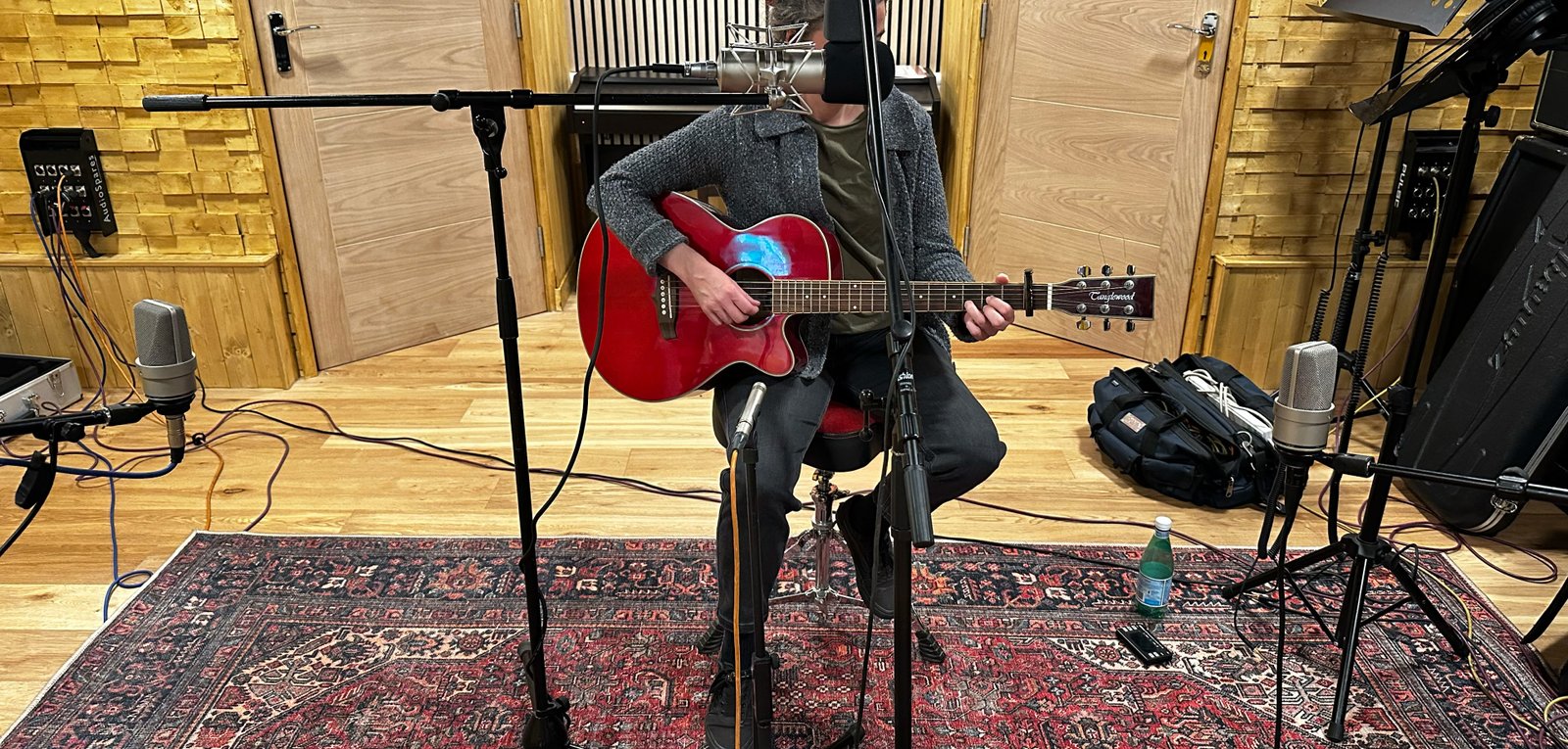 Acoustic singer/songwriter recording in a Kent recording studio.
