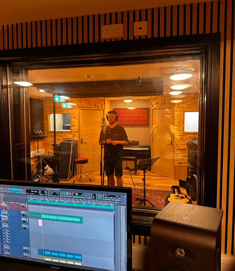 Singer in live room recording at Oastview Residential in Marden Kent
